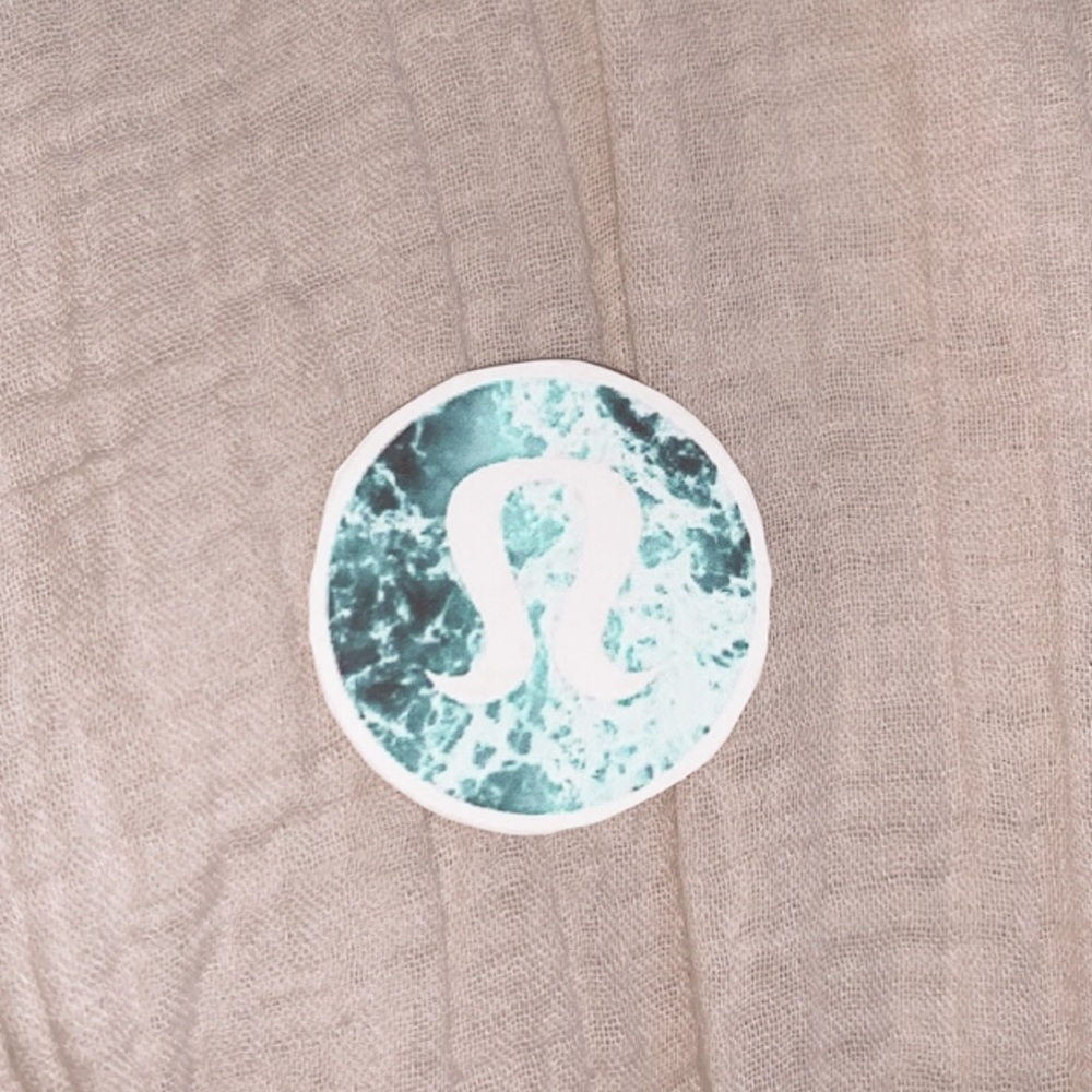 Lululemon sticker w/ a cute background